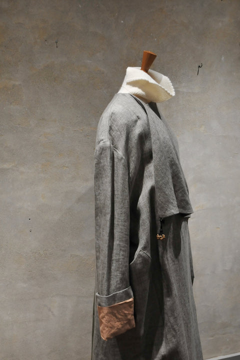 Double satin collarless coat